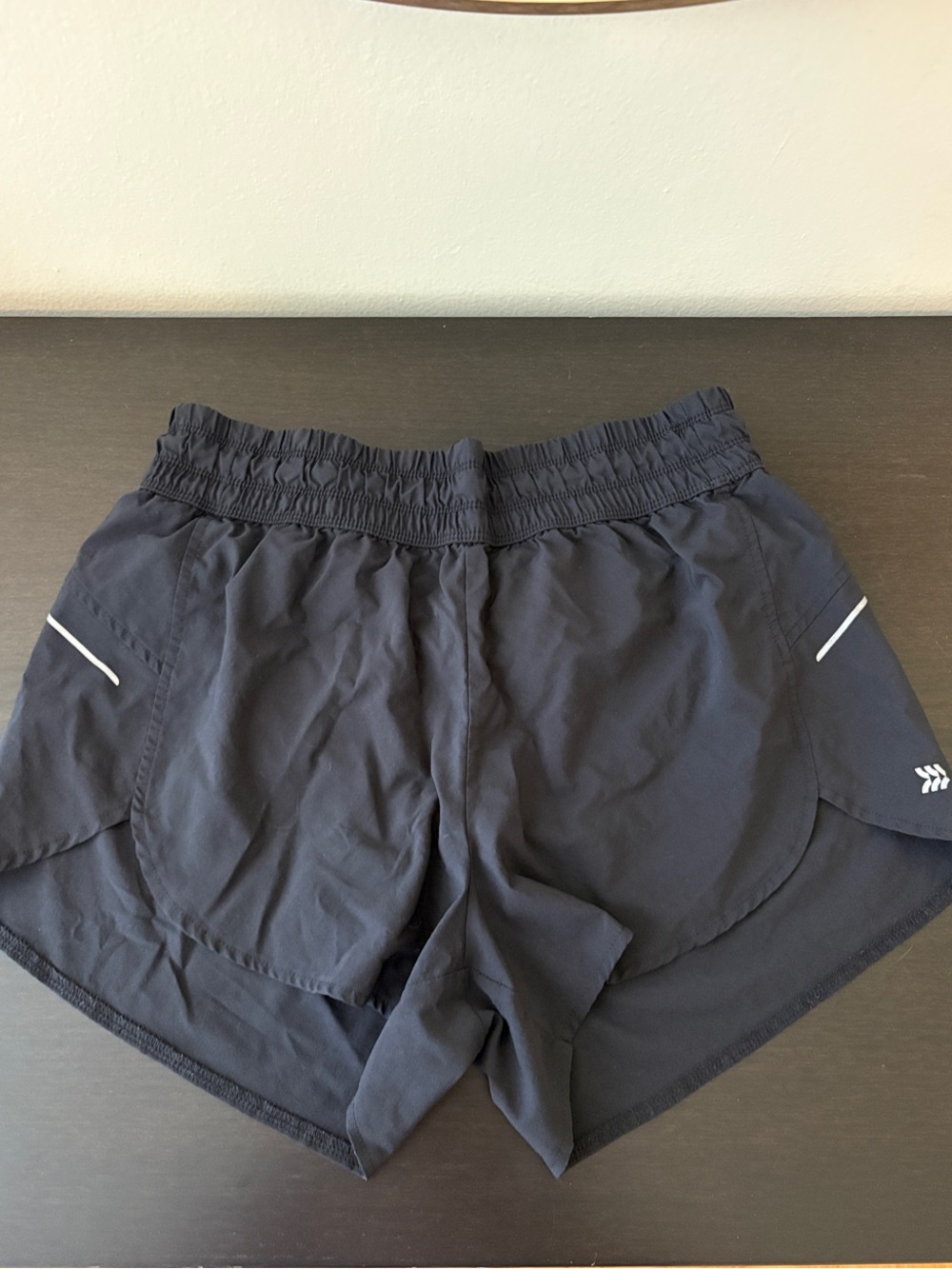 all in motion Black Women's Athletic Running Shorts with Reflective Trim.